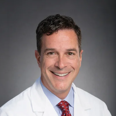 A headshot photo of Dr. Jay Grossman