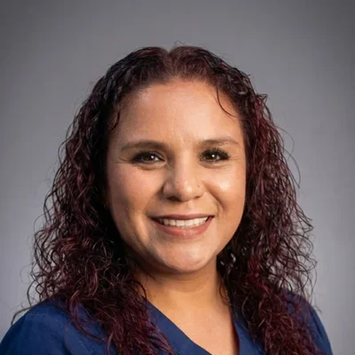 A headshot photo of Ana