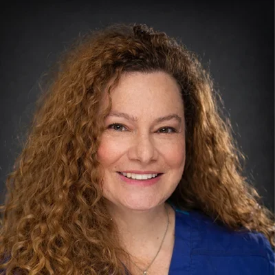 A headshot photo of Elana