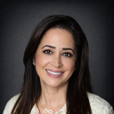 A headshot photo of Sharon